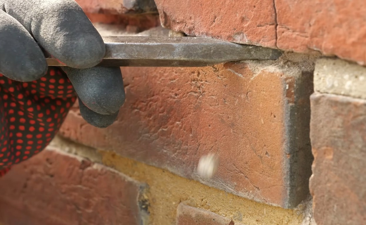 Professional tuckpointing and repointing work on brick wall in McAllen, TX